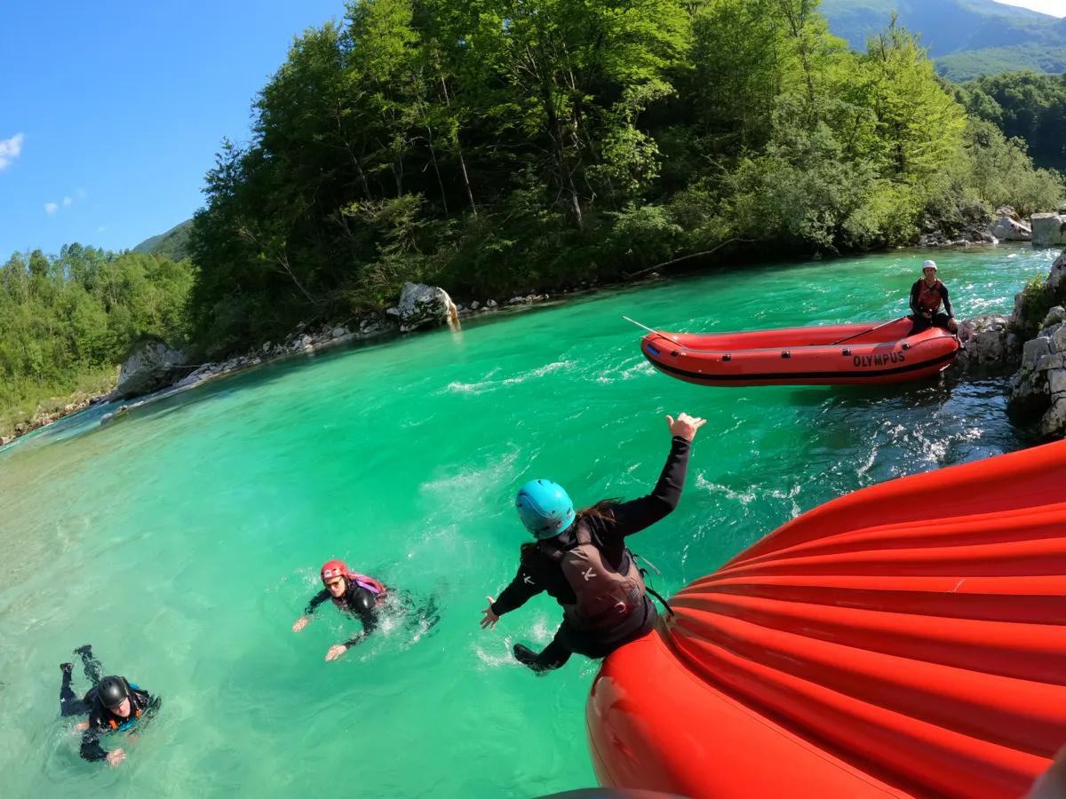 Jumping into the Soča during rafting